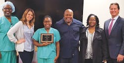 2017 SEVY Award: (from left): SPD Manager Yves Theodule, Surgical Services Executive Director Katie Sikora, Award Winner Mykeal Hood & her proud family, Chief Operating Officer Matt Primack. 2017 SEVY Award: (from left): SPD Manager Yves Theodule, Surgical Services Executive Director Katie Sikora, Award Winner Mykeal Hood & her proud family, Chief Operating Officer Matt Primack.
