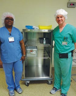 Jim Tyrell and Nikisha Hall with standardized case cart Jim Tyrell and Nikisha Hall with standardized case cart