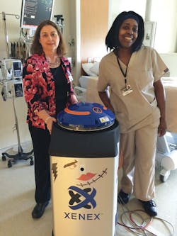 Infection Preventionist Martha Bouk, Albert the robot, and Hannah from Environmental Services Infection Preventionist Martha Bouk, Albert the robot, and Hannah from Environmental Services