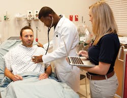 A CareThrough scribe records patient data. A CareThrough scribe records patient data.