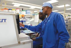 Terris Porchea, SPD Educator, instructing Brian Freeman, Instrument Tech I, on an instrument process, using an Assisted Instrument Management (AIM) system. Porchea has been key in developing annual and orientation competencies to ensure all staff are able to perform tasks required of their position and that processes are also standardized to ensure quality and safety. Terris Porchea, SPD Educator, instructing Brian Freeman, Instrument Tech I, on an instrument process, using an Assisted Instrument Management (AIM) system. Porchea has been key in developing annual and orientation competencies to ensure all staff are able to perform tasks required of their position and that processes are also standardized to ensure quality and safety.