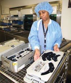 Erica Collier receiving items from the washer Erica Collier receiving items from the washer