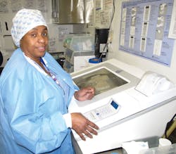 Janet Fisher processing a flexible scope Janet Fisher processing a flexible scope