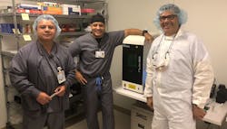 From Left to Right. &ldquo;Rigo&rdquo; Cardenas 1st shift Superviser, Shawn M Flynn Manager Sterile Processing / OR Services, and Gus Vargas Rep from NuTrace. They are standing near the newly installed Laser from NuTrace.