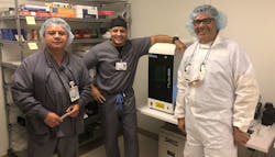 From Left to Right. “Rigo” Cardenas 1st shift Superviser, Shawn M Flynn Manager Sterile Processing / OR Services, and Gus Vargas Rep from NuTrace. They are standing near the newly installed Laser from NuTrace. From Left to Right. “Rigo” Cardenas 1st shift Superviser, Shawn M Flynn Manager Sterile Processing / OR Services, and Gus Vargas Rep from NuTrace. They are standing near the newly installed Laser from NuTrace.