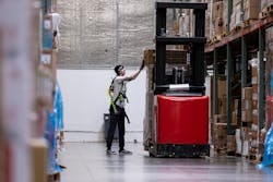 Chance Redman picks an order from the pallet on the forklift. Chance Redman picks an order from the pallet on the forklift.