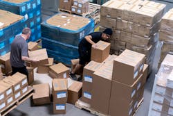 Victor Carbone and Steve Salazar break down pallets. Victor Carbone and Steve Salazar break down pallets.