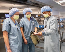 Checking sterilizer load tape on the sterile side of pass-through sterilizers: Lesya Matsuk, Melissa Gawerecki , Carlo Delos Reyes Checking sterilizer load tape on the sterile side of pass-through sterilizers: Lesya Matsuk, Melissa Gawerecki , Carlo Delos Reyes