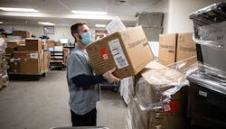 Ryan Davis, one of Sutter’s Distribution Supervisors, preps needed PPE for rapid distribution during the height of a major COVID-19 surge. Ryan Davis, one of Sutter’s Distribution Supervisors, preps needed PPE for rapid distribution during the height of a major COVID-19 surge.