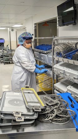 Deidre Wilson loading the container rack Deidre Wilson loading the container rack