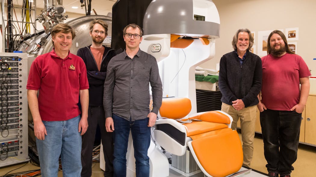 Dr. Michael Garwood and his team with the MRI scanner.