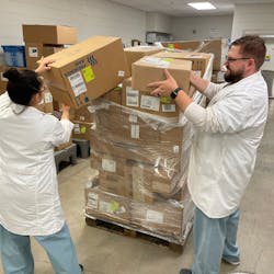 Giselle Morales and Maciej Gacek - Hyde Park Procedural Inventory Planners breaking down an order to deliver. Giselle Morales and Maciej Gacek - Hyde Park Procedural Inventory Planners breaking down an order to deliver.