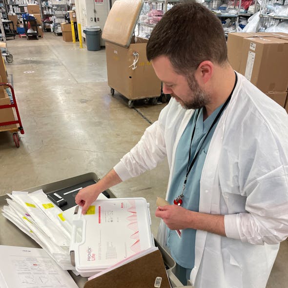 Jake Morgan - Procedural Inventory Planner in Hyde Park - RIFD tagging implants before re-stocking cabinets.