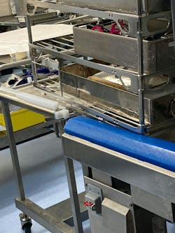 This picture shows equipment in need of repair. The instrument washer rack transport cart is not level with the loading dock of the washer, creating a safety issue. This picture shows equipment in need of repair. The instrument washer rack transport cart is not level with the loading dock of the washer, creating a safety issue.