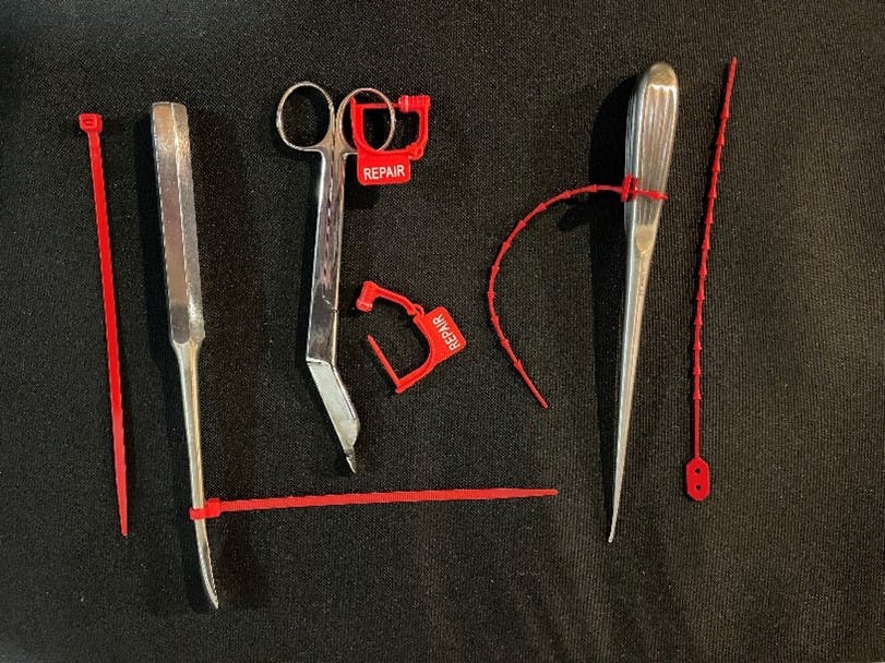 Figure 1 &ndash; Some of the various options for tagging damaged instruments. Photo by Stephen M. Kovach