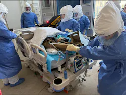 The UNC Medical Center Special Pathogens Response Center (SPARC) team practices caring for a patient with a high-consequence infectious disease using a mannequin during the 2025 Tranquil Passport exercise.